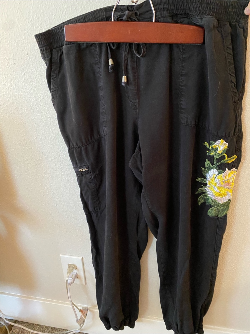 Anthropologie Black Track Joggers with Yellow Floral Embroidery